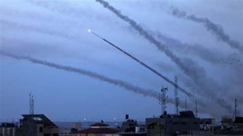 Israeli military says it is striking targets in the Gaza Strip as air raid sirens sound in Jerusalem